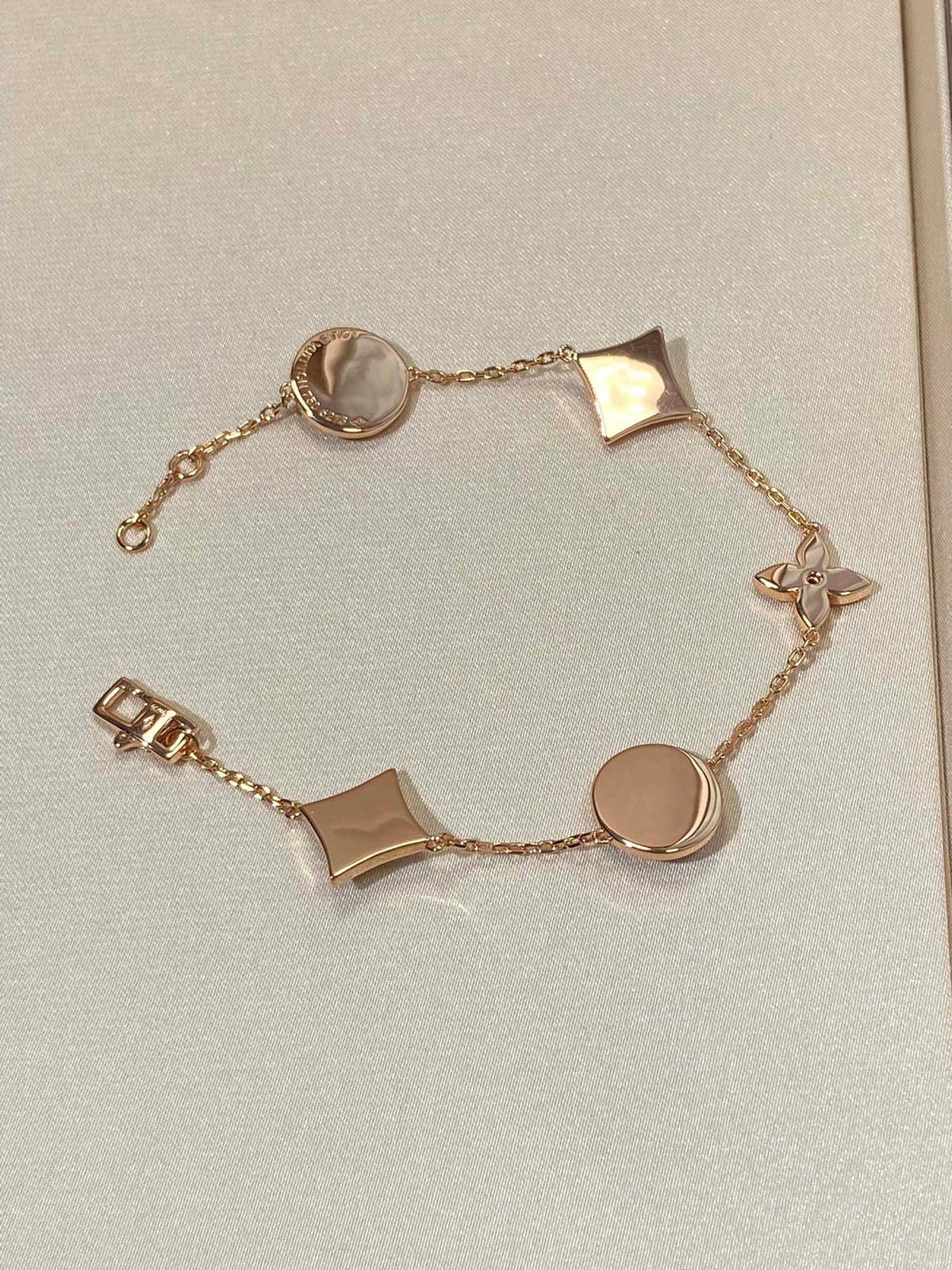 [Glow Muse]STAR AND SUN 5 MOTIF MOP PINK GOLD BRACELET